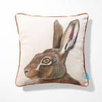 Hare Cushion Call of the Wild with orange piping