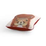 Squirrel cushion Call of the Wild with scarlet piping and orange back